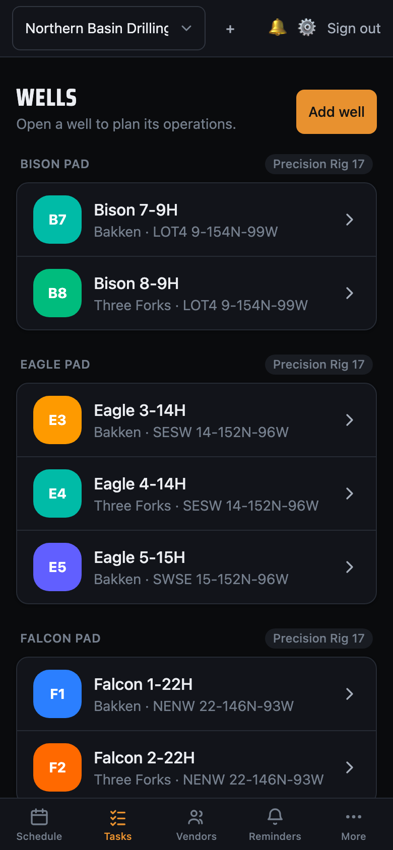 LookAhead Pro on a phone — the wells list grouped by pad, each pad tagged with its rig.